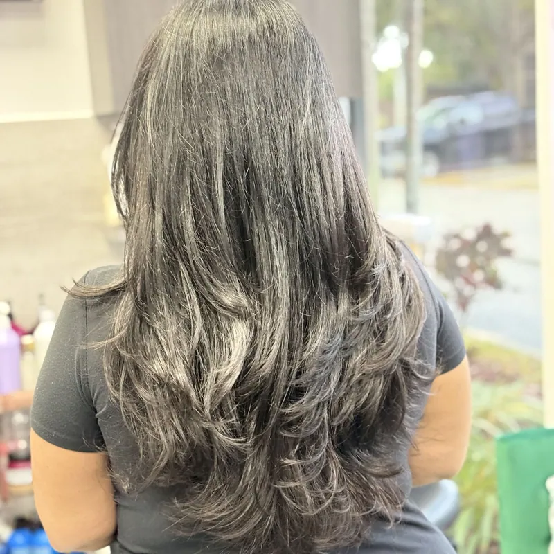 Long hair smoothed smooth and glossy, moving freely
