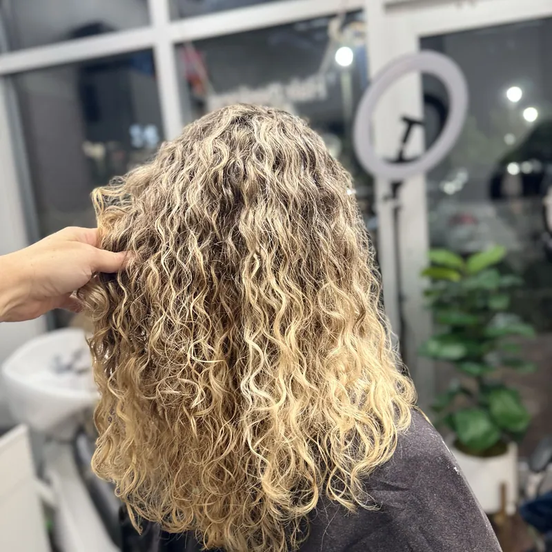 Defined, hydrated curls after a curly haircut