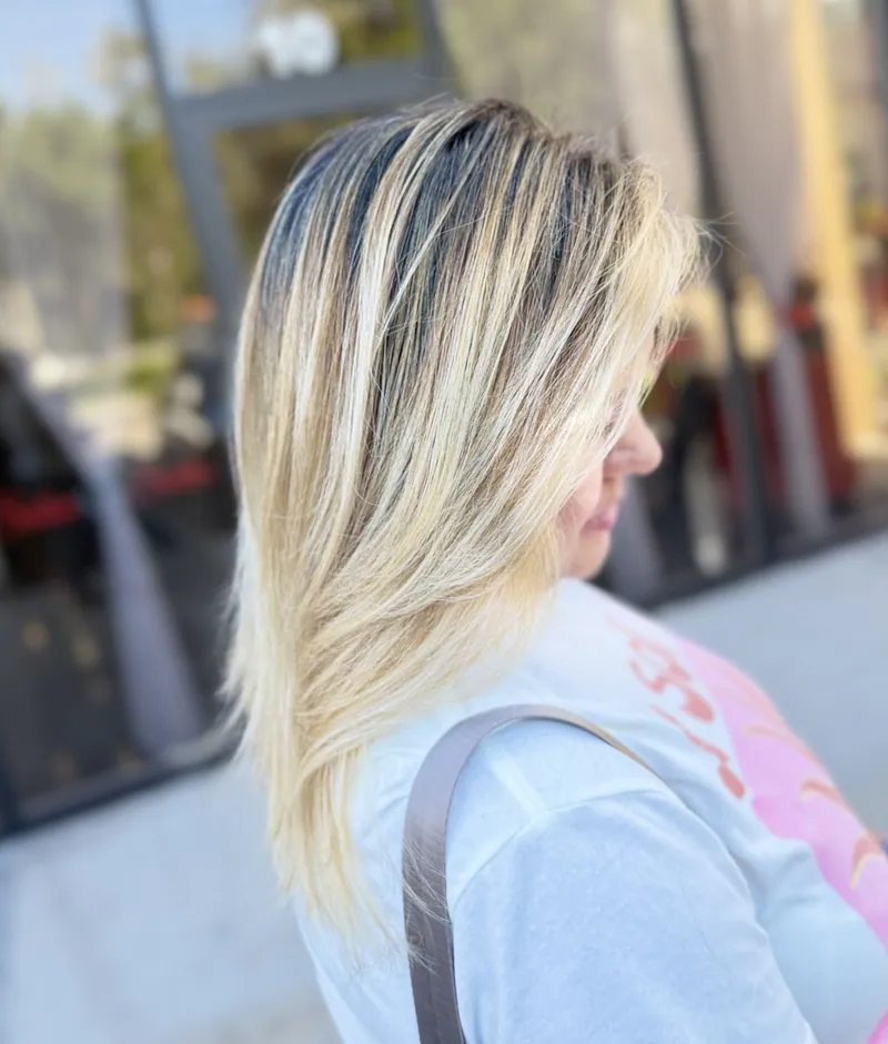 Seamless blonde balayage, side view
