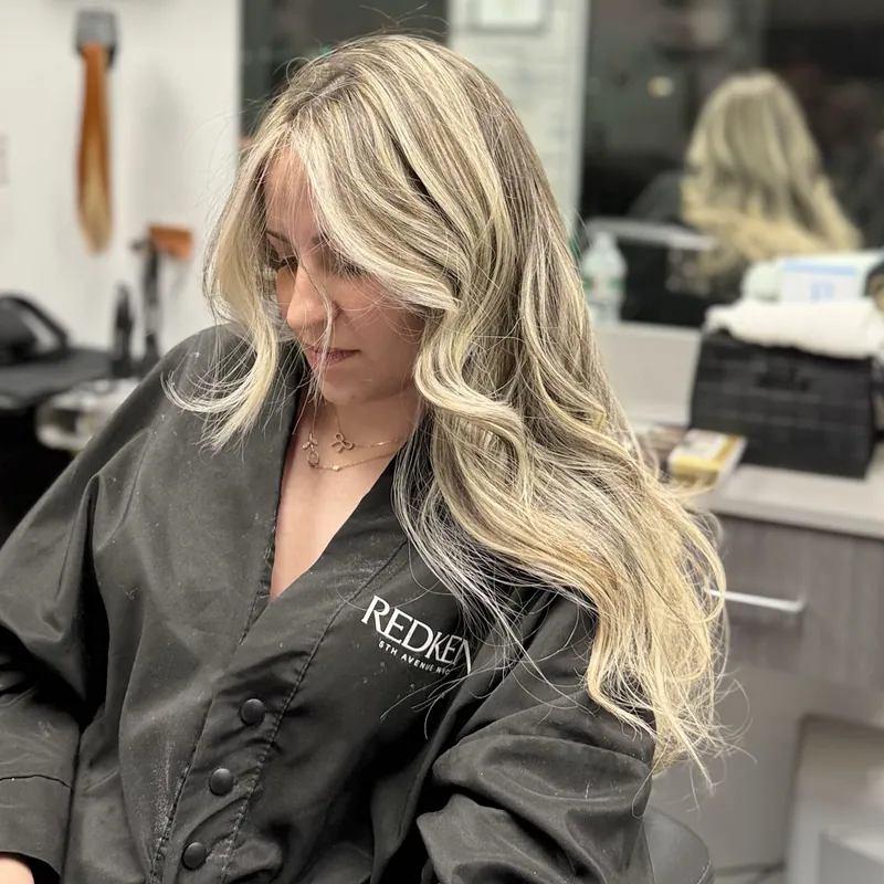 A client in my chair with fresh blonde waves