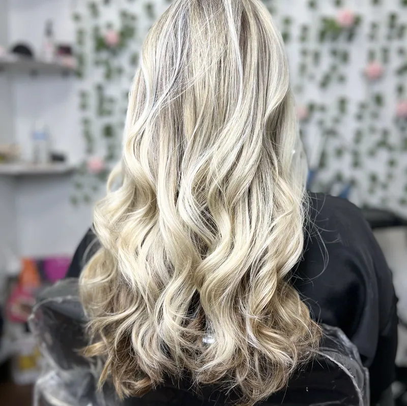 Ribbons of blonde through long hair